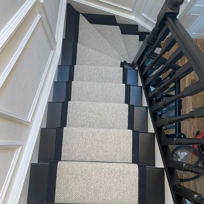 Brockway Carpets Windermere Weave with black fabric edge and black jubilee stair rods REF 12405