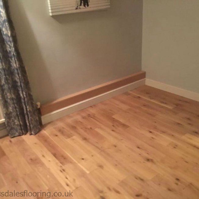 Real Oak Plank Flooring with MDF Skirting & Boxed in Pipes